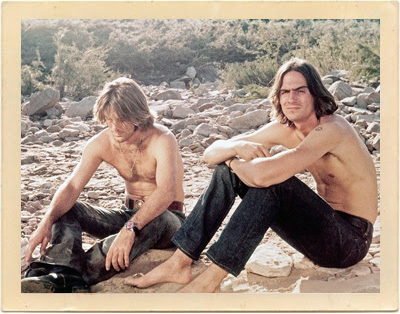 James Taylor and Dennis Wilson wait for shooting to resume on the film, “Two-Lane Blacktop” in the desert outside Santa Fe, New Mexico.