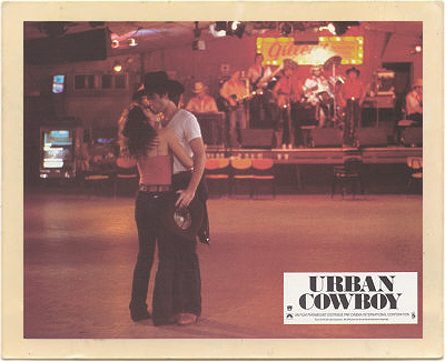 John Travolta and Debra Winger get intimate on the enormous dance floor at Gilley’s night club, in a scene from the movie, “Urban Cowboy.”
